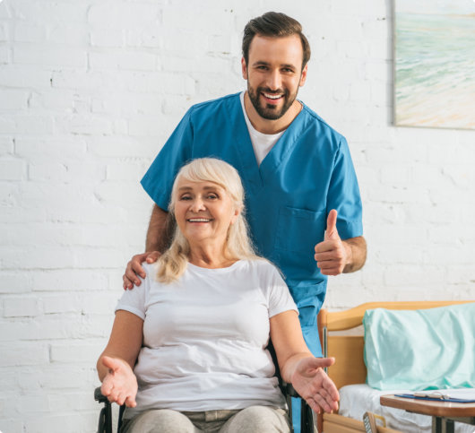 Male caregiver thumbs up